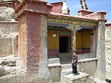 Tibet Guge 05 Tsaparang 03 Chapel Of The Prefect Outside Just inside the Tsaparang entrance is the Chapel of the Prefect, a small building that was a private shrine for Tsaparang's prefect (regent). Inside the bare room of four columns are murals dating from the late 16C, originally blackened by fire and smoke, but now a little clearer after being cleaned.